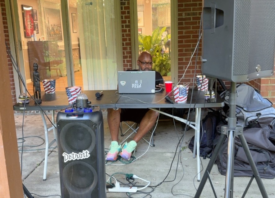 DJ Metaphoric working at his outdoor DJ setup